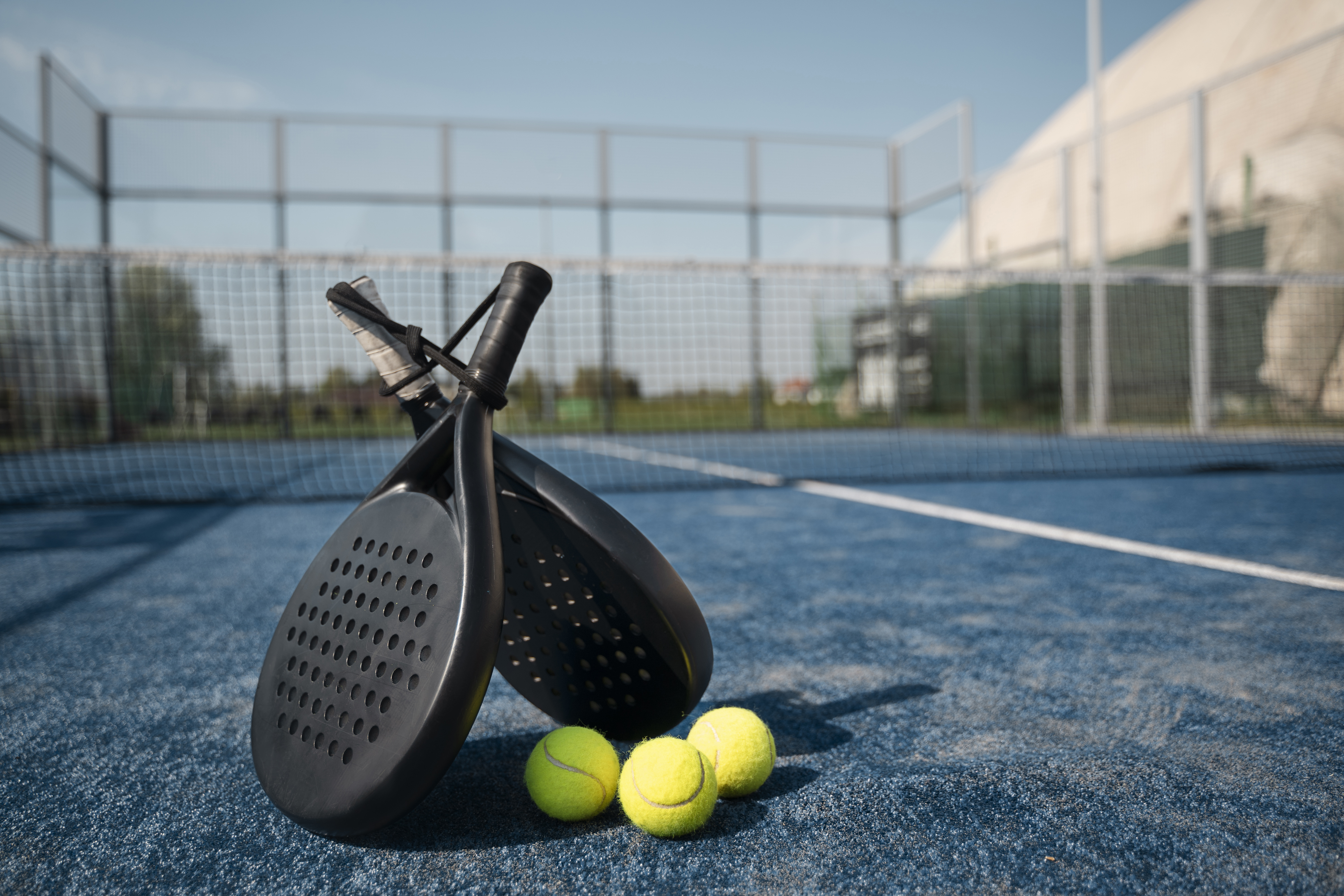 Padel rackets and balls